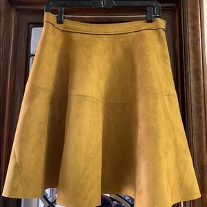Faux (vegan) suede golden yellow skirt. Size medium.